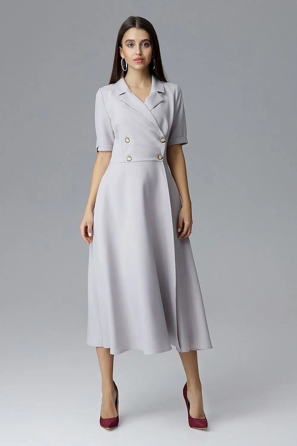 A 7/8-length double-breasted Daydress  Figl