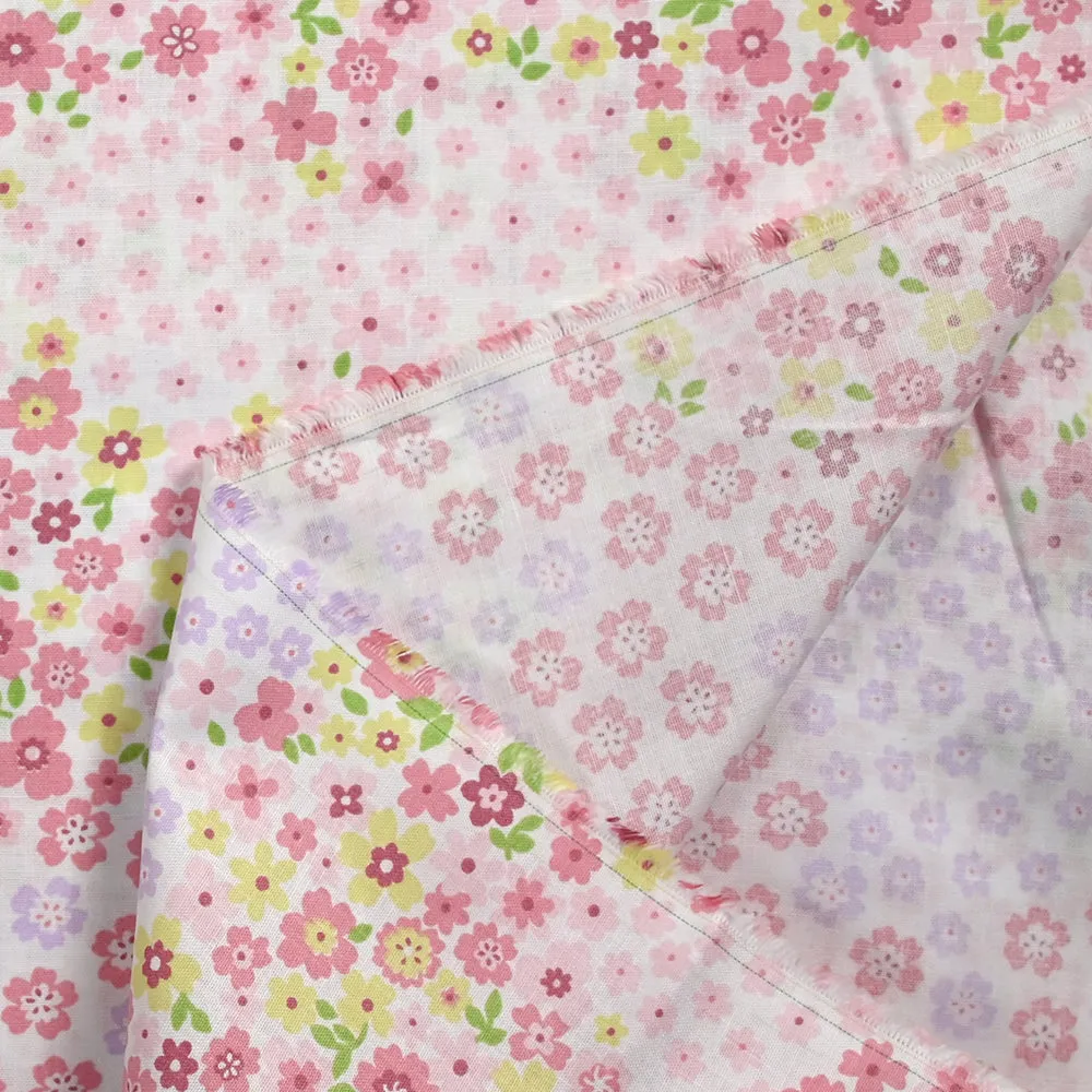 Coton imprimé fleurs Adèle rose fond blanc