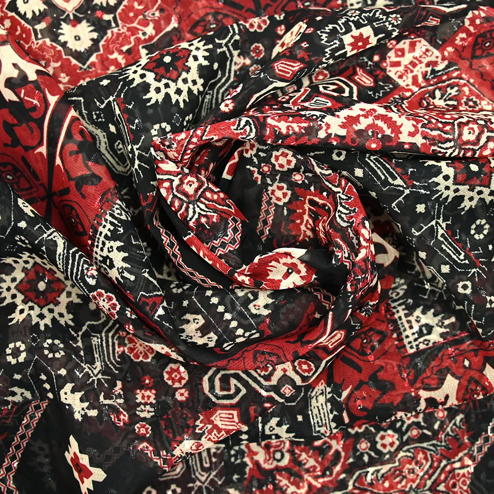 Mousseline imprimée plumetis lurex ornement rouge fond noir